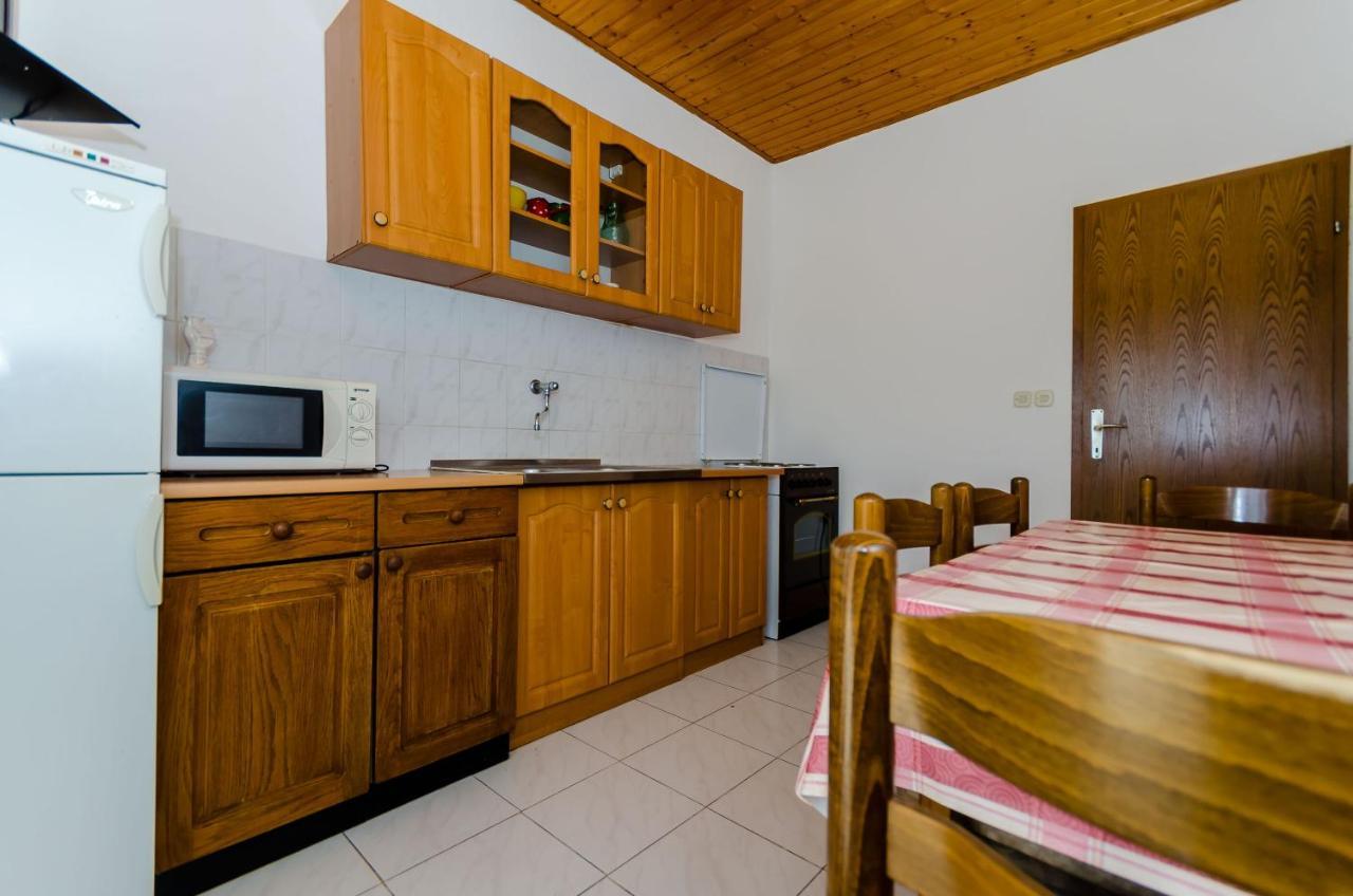 Apartments Kursan Traù Esterno foto