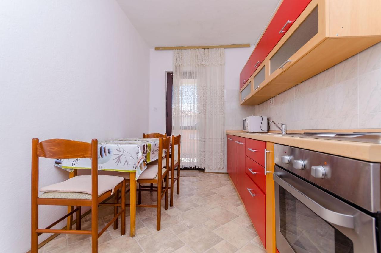 Apartments Kursan Traù Esterno foto