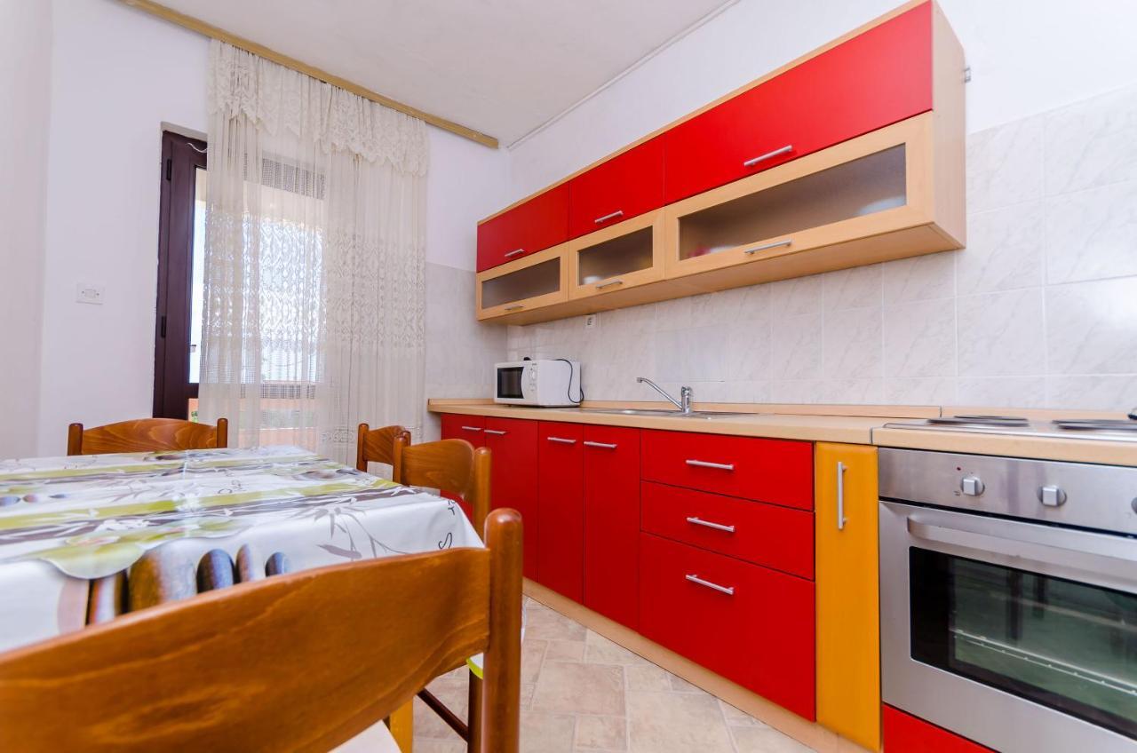 Apartments Kursan Traù Esterno foto