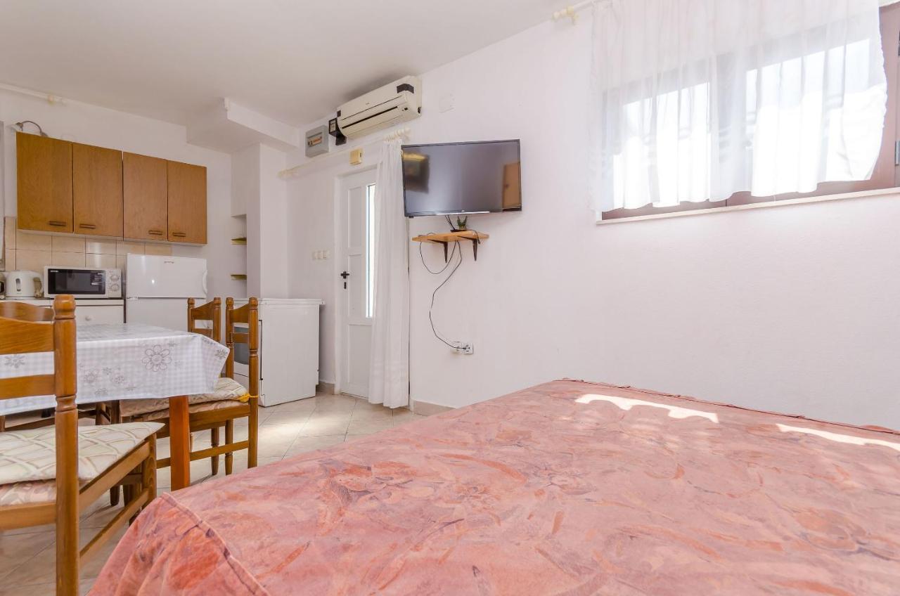 Apartments Kursan Traù Esterno foto